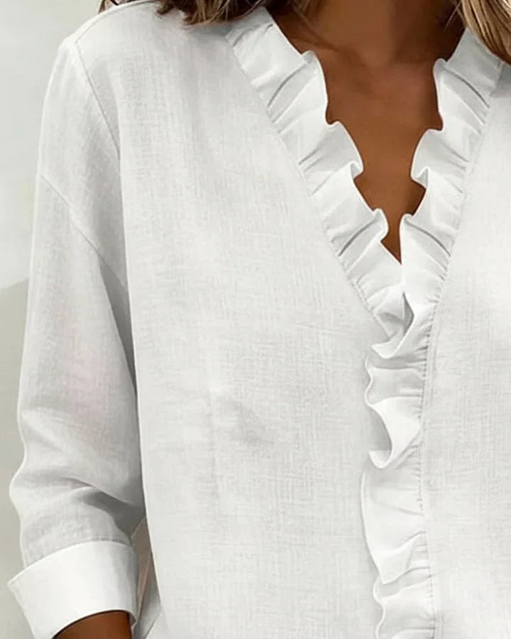 Indy - Blouse chic à col en V à volants